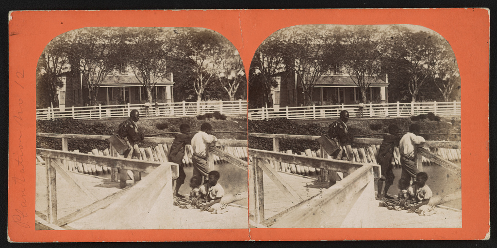Old Bacchus fishing from a bridge at Rockville Plantation, October 1860
